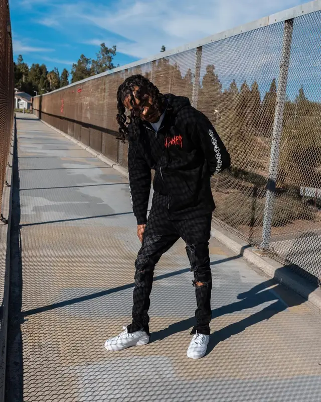 Chris Travis outfit in FashionNova and Nike, 2022