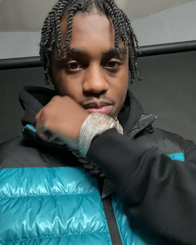 Lil Tjay outfit in Moncler and Amiri, 2022