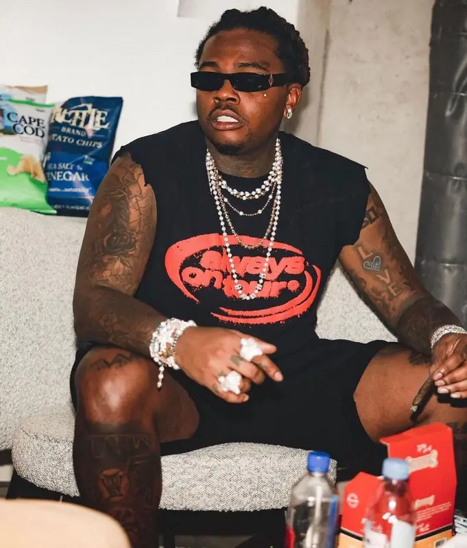 Gunna outfit in Nike, Dior, and Cactus Plant Flea Market, 2022