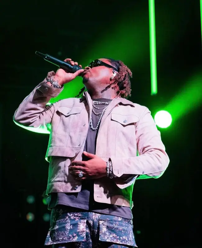 Gunna outfit in Gallery Sinatra Couture, Nike, and Dior, 2022