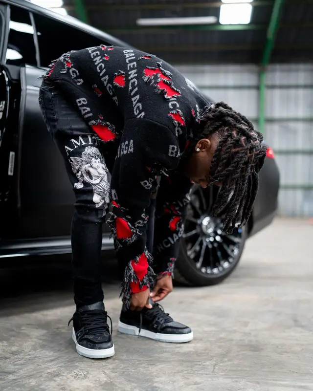 Kai Cenat outfit in Balenciaga, Amiri, and Louis Vuitton, 2021