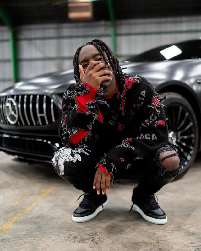Kai Cenat outfit in Balenciaga, Amiri, and Louis Vuitton, 2021