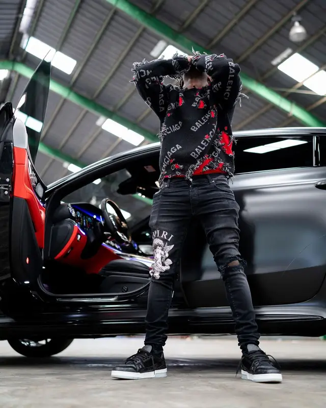Kai Cenat outfit in Balenciaga, Amiri, and Louis Vuitton, 2021
