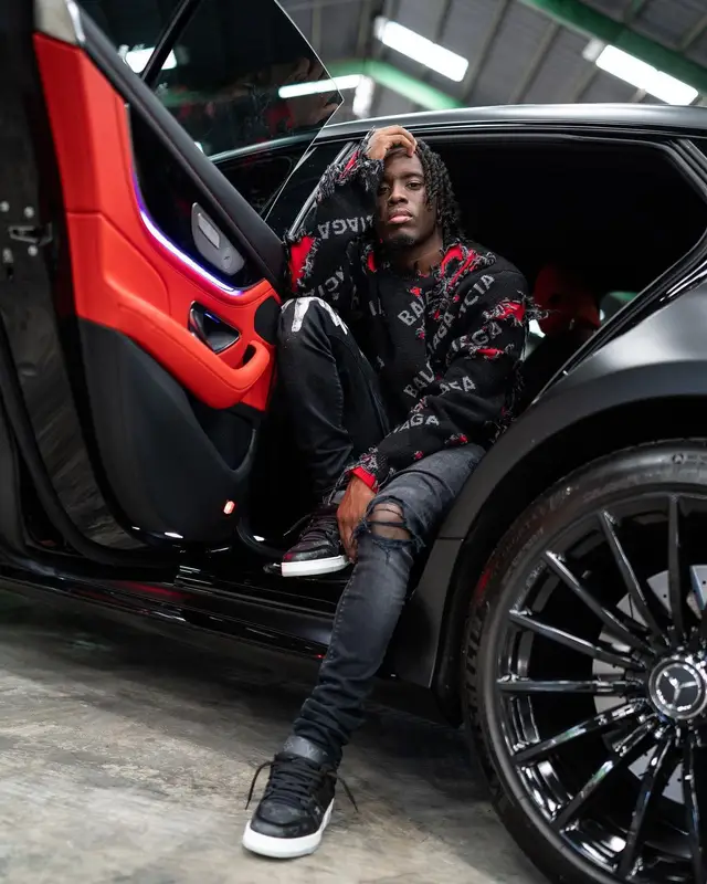 Kai Cenat outfit in Balenciaga, Amiri, and Louis Vuitton, 2021
