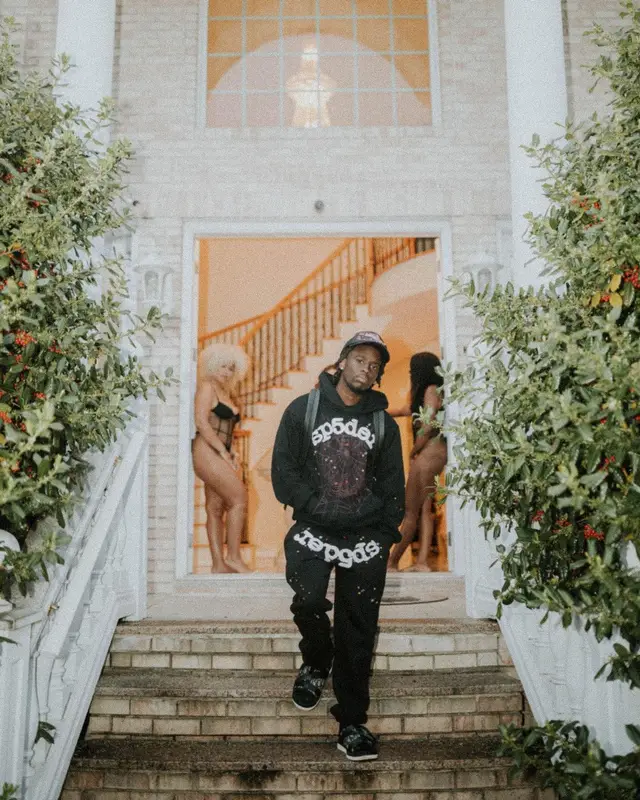 Kai Cenat outfit in Louis Vuitton, Young Thug Merch, and Spider Worldwide, 2021