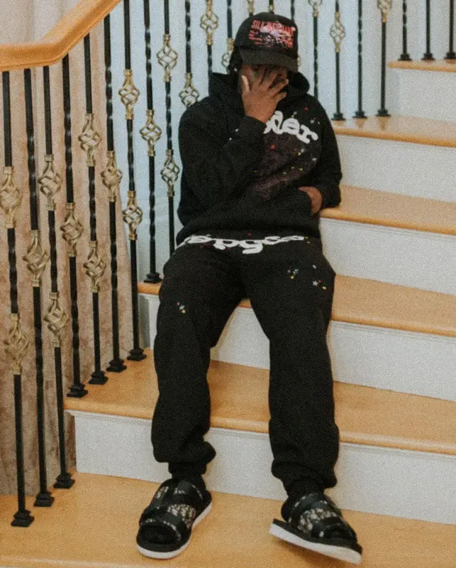 Kai Cenat outfit in Louis Vuitton, Young Thug Merch, and Spider Worldwide, 2021