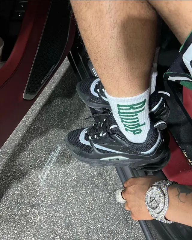 Lil Migo outfit in Tulones, Dior, and Rhude, 2022