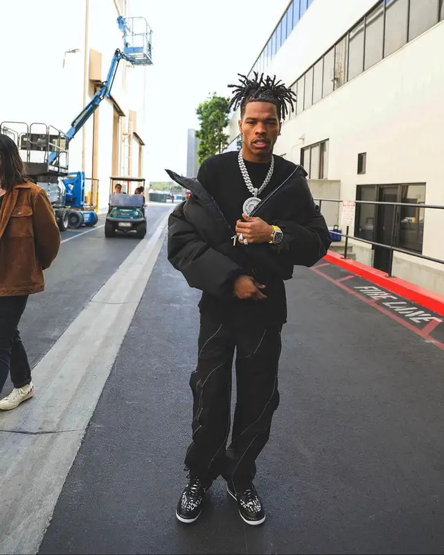 Lil Baby outfit in 1017 Alyx 9SM, Post Archive Faction, and Moncler, 2022