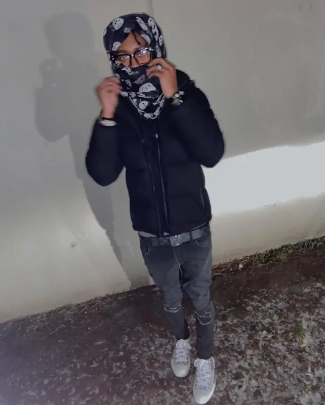 Lil Benny outfit in Chrome Hearts, Louis Vuitton, and Alexander McQueen, 2022