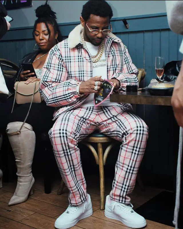 Fabolous outfit in Supreme, Nike, and Burberry, 2022