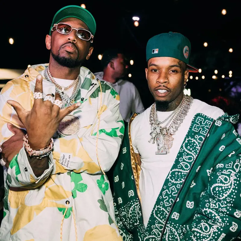 Tory Lanez outfit in Rhude and New Era, 2022