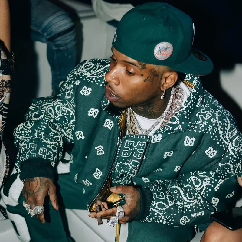Tory Lanez outfit in Rhude and New Era, 2022