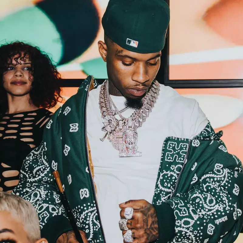 Tory Lanez outfit in Rhude and New Era, 2022