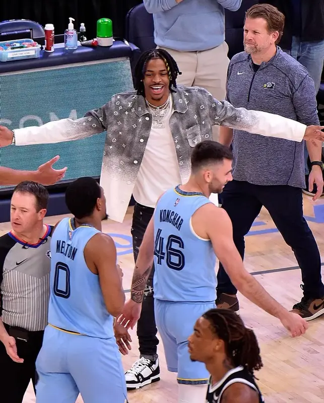 Ja Morant outfit in Louis Vuitton and Amiri, 2022