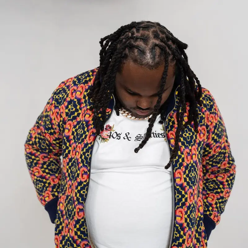 Tee Grizzley outfit in Gucci, 40s & Shorties, and Amiri, 2022