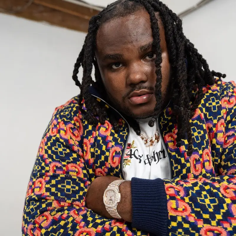 Tee Grizzley outfit in Gucci, 40s & Shorties, and Amiri, 2022