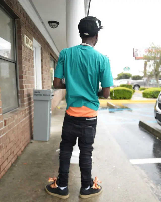 Quando Rondo outfit in Lanvin, Amiri, and Balenciaga, 2022