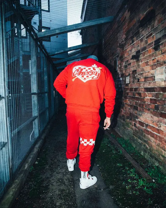 M Huncho outfit in Cherry, Jordan, and Awake NY, 2022