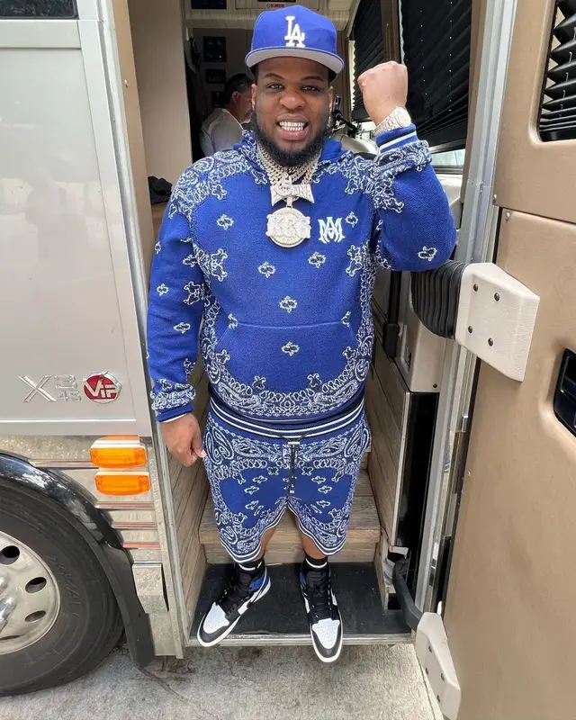 Maxo Kream outfit in Amiri, Nike, and New Era, 2022