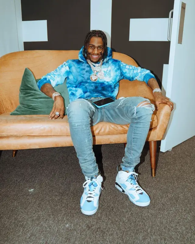 Russ Millions outfit in Amiri, Jordan, and Dior, 2022
