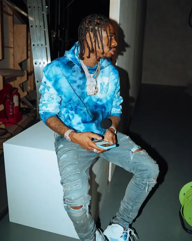 Russ Millions outfit in Amiri, Jordan, and Dior, 2022