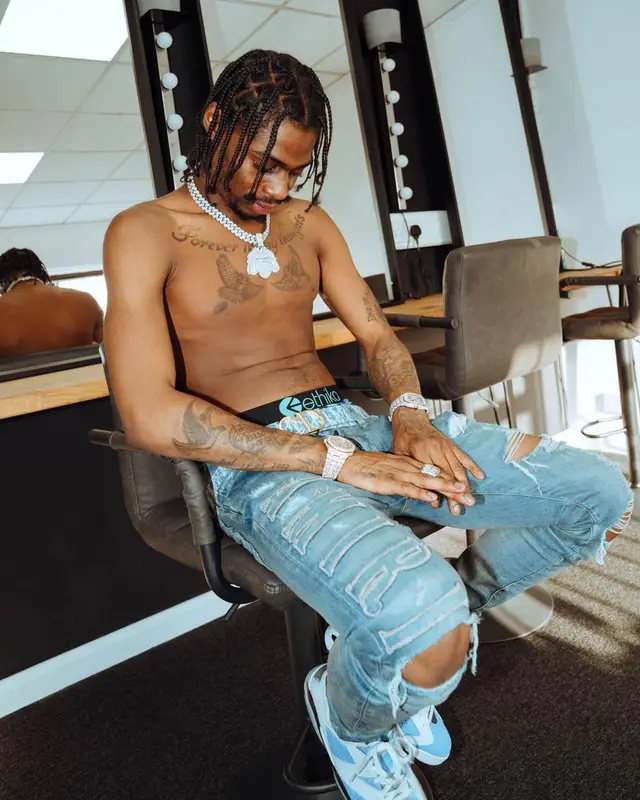Russ Millions outfit in Amiri, Jordan, and Dior, 2022