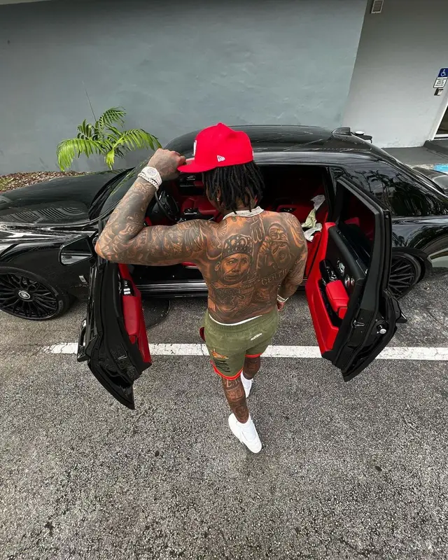 Moneybagg Yo outfit in Bape, New Era, and Readymade, 2022