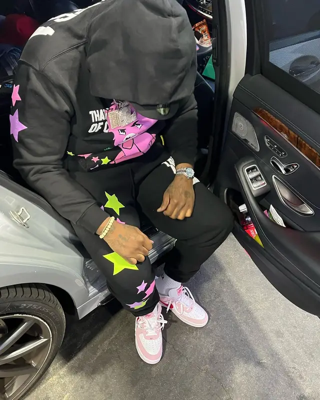 Peezy outfit in Awful Lot of Cough Syrup, Nike, and Coi Leray Merch, 2022