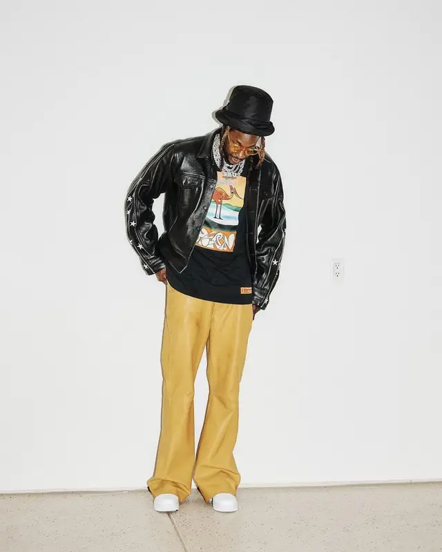 2 Chainz outfit in Cease±Desist, Heron Preston, and Prada, 2022