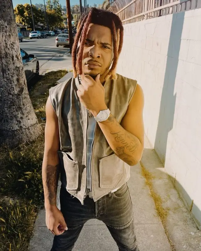 Lil Keed outfit in Balenciaga, Off-White, and Louis Vuitton, 2022