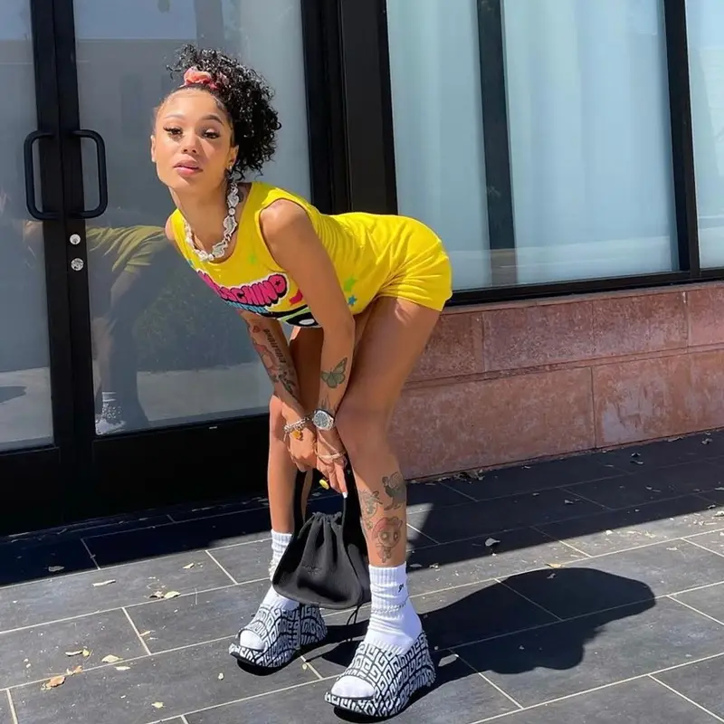 Coi Leray outfit in Moschino, Alexander Wang, and Givenchy, 2022
