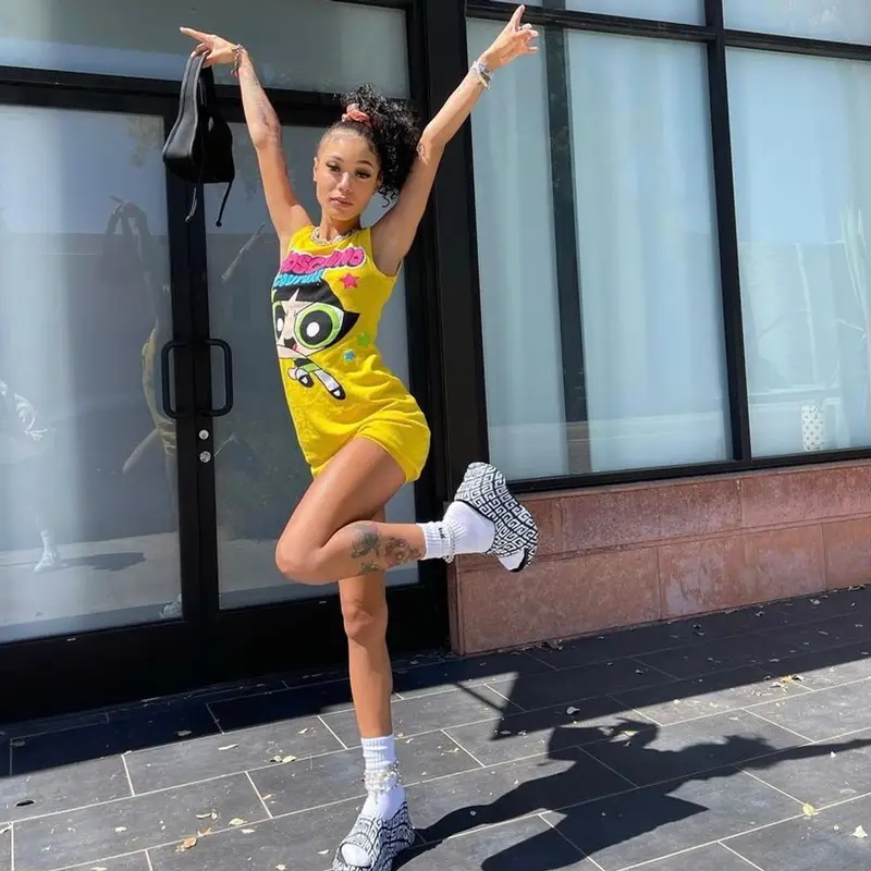 Coi Leray outfit in Moschino, Alexander Wang, and Givenchy, 2022