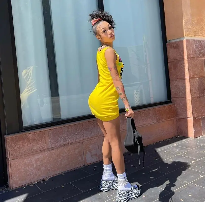 Coi Leray outfit in Moschino, Alexander Wang, and Givenchy, 2022