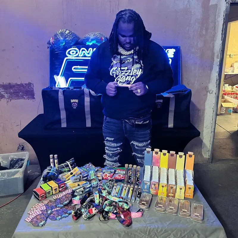 Tee Grizzley outfit in Amiri, Burberry, and Saint Laurent, 2022