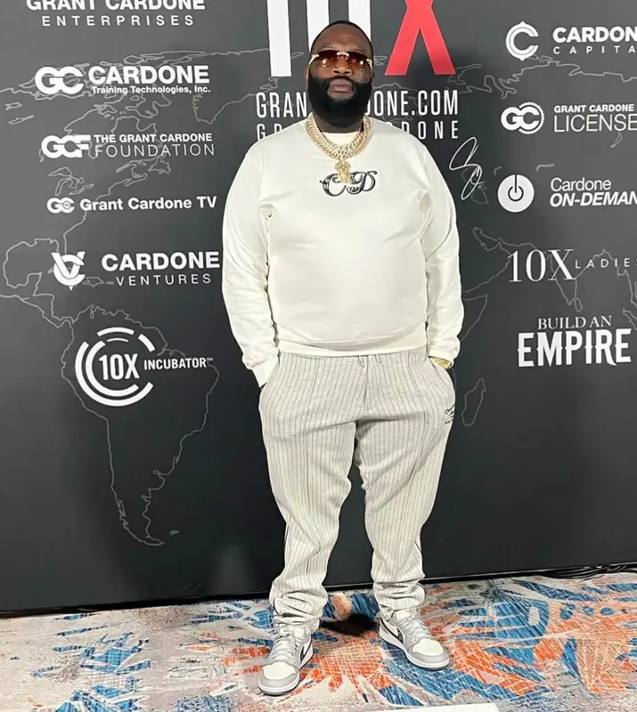 Rick Ross outfit in Dior, Nike, and Kenny Scharf, 2022
