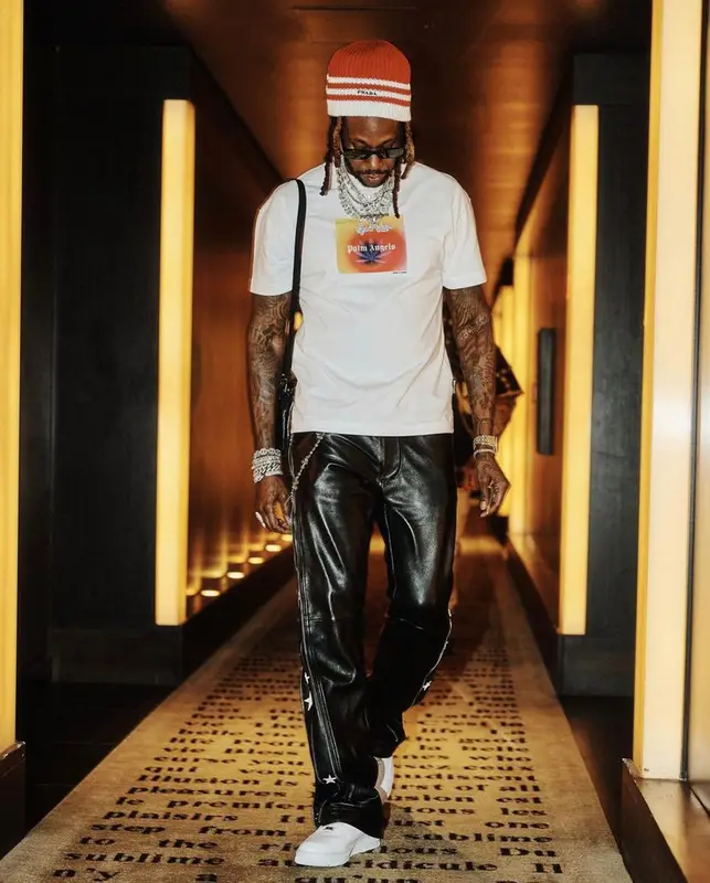 2 Chainz outfit in Palm Angels, Prada, and The Webster, 2022