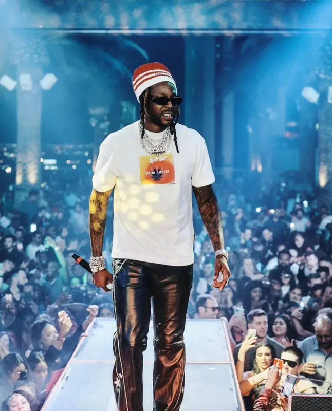 2 Chainz outfit in Palm Angels, Prada, and The Webster, 2022