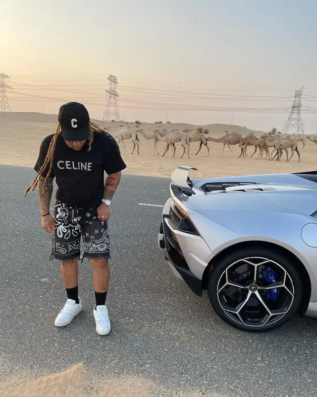 Reggie Mills outfit in Louis Vuitton and Celine, 2022