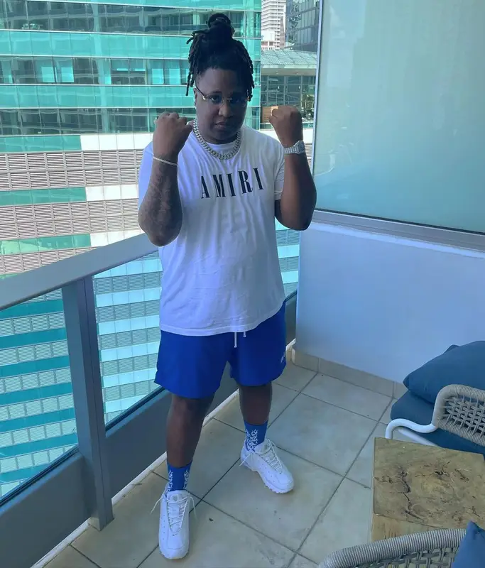 Tay Keith outfit in Amiri, Nike, and Cartier, 2022