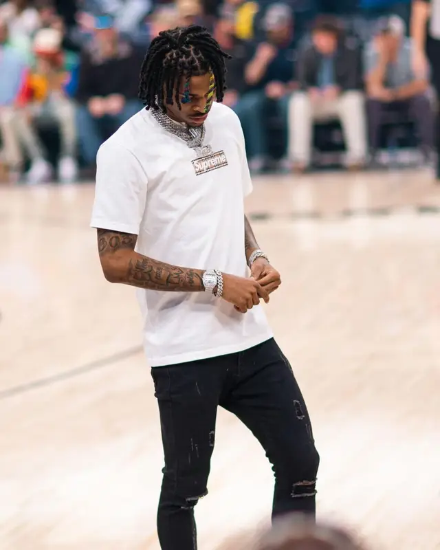 Ja Morant outfit in Supreme, Serenede, and Burberry, 2022