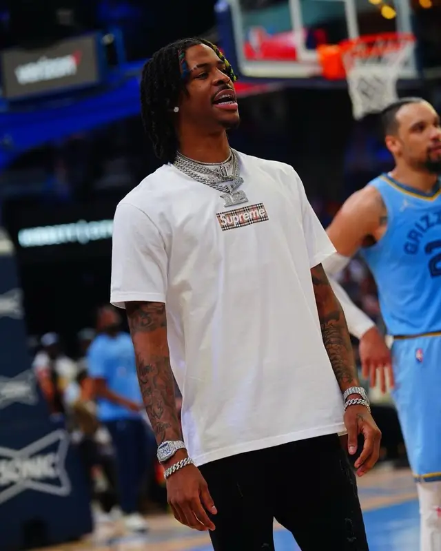 Ja Morant outfit in Supreme, Serenede, and Burberry, 2022