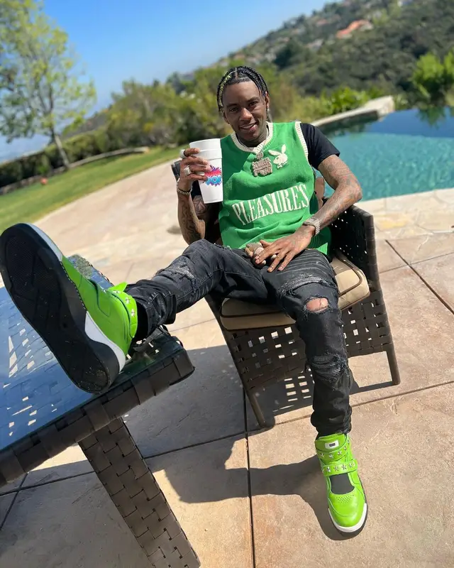 Soulja Boy outfit in Pleasures, Versace, and Playboy, 2022