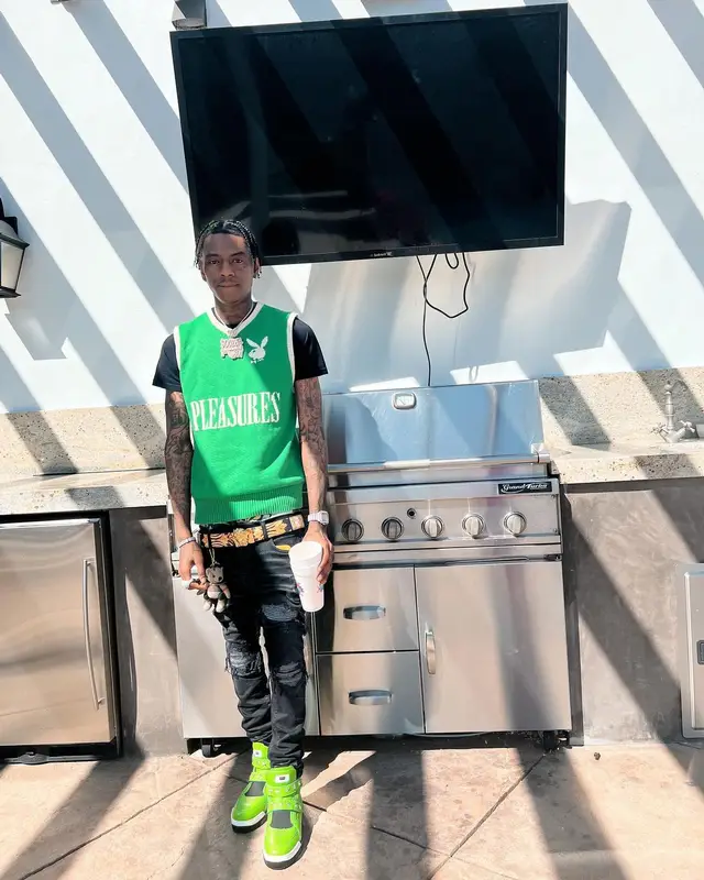 Soulja Boy outfit in Pleasures, Versace, and Playboy, 2022