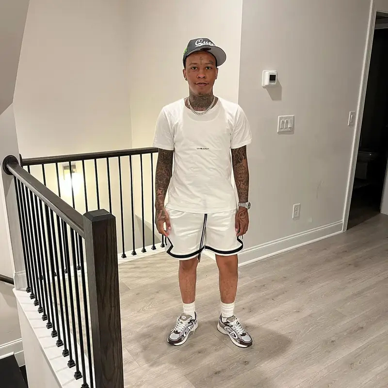 SG Tip outfit in Saint Laurent, Amiri, and Dior, 2022