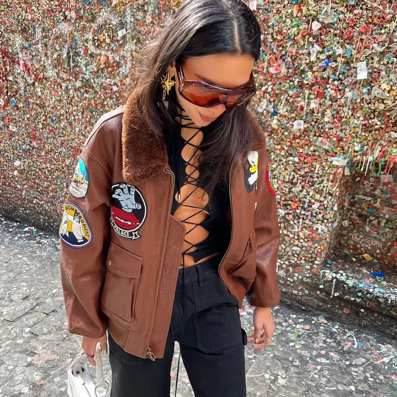 Dua Lipa outfit in Palace, Jean Paul Gaultier, and Tom Ford, 2022