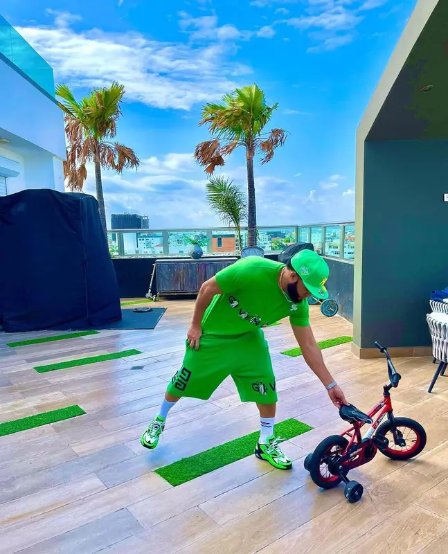 El Alfa El Jefe outfit in Givenchy, Louis Vuitton, and Balenciaga, 2022