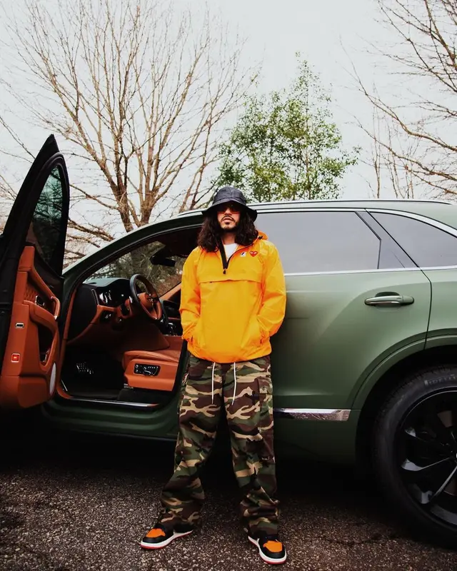 Russ outfit in Comme Des Garcons, Celine, and Dolce & Gabbana, 2022