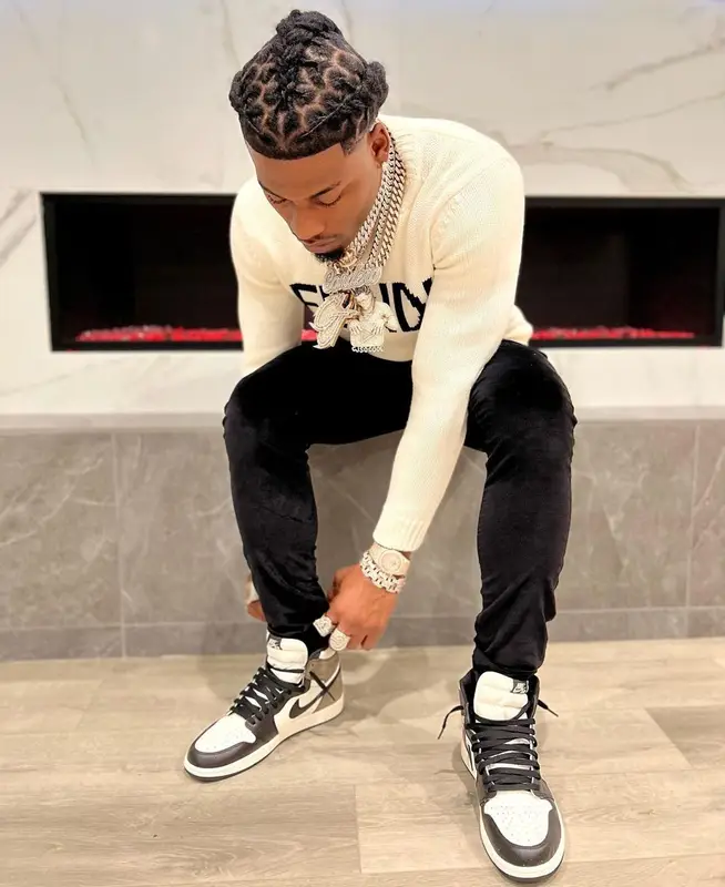 CJ So Cool outfit in Fendi, Amiri, and Nike, 2022