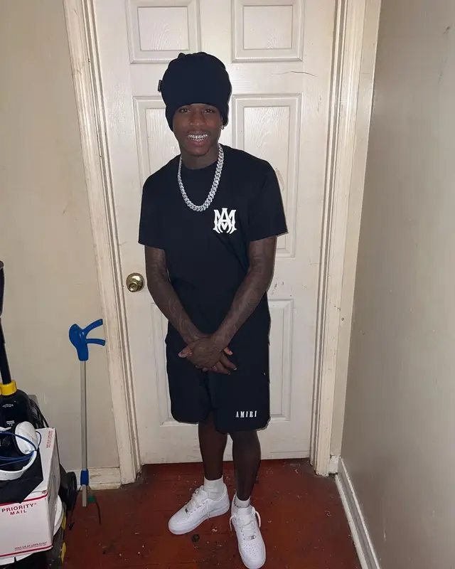 Quando Rondo outfit in Amiri, Nike, and Palm Angels, 2022