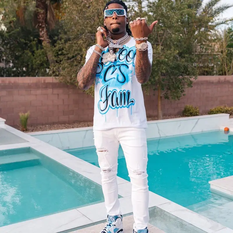 CJ So Cool outfit in Amiri, Nike, and Louis Vuitton, 2022
